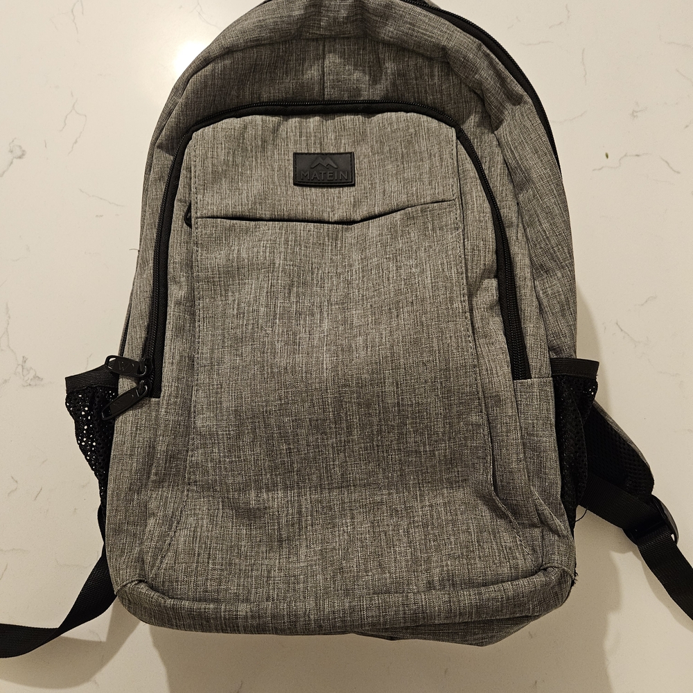 Gray Backpack by Eastpak